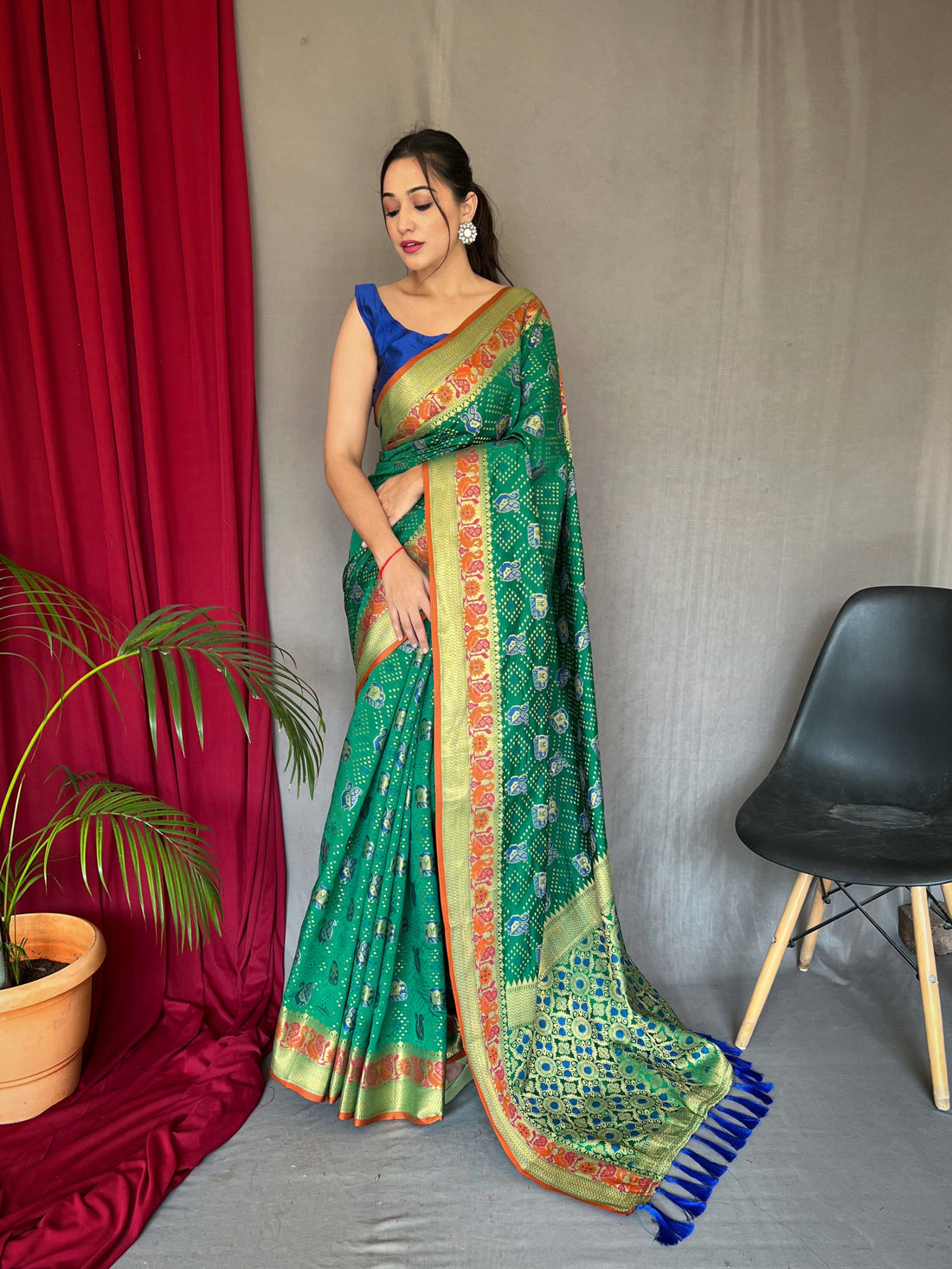 Teal Green Patola Silk Saree With Zari Weaving Work